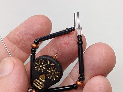 Both back legs, one with a clip and one without